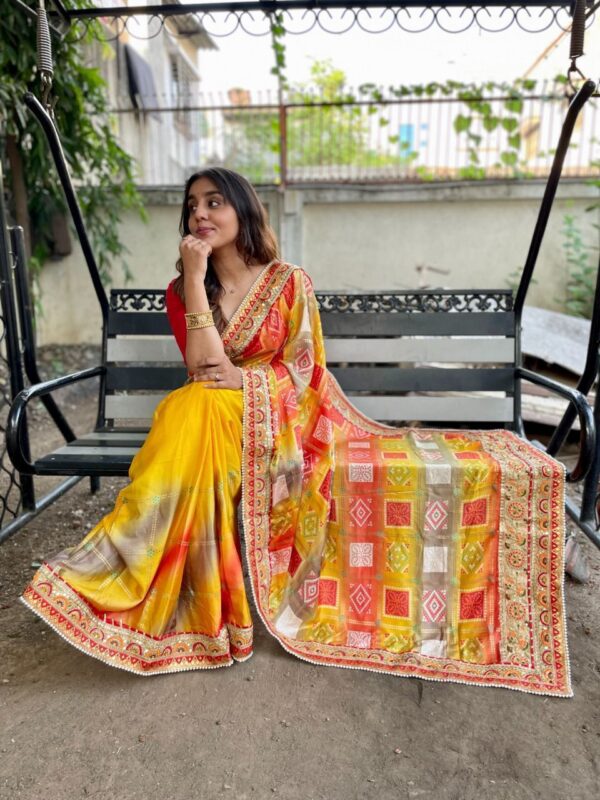 Yellow color dola silk saree with printed and sequence work