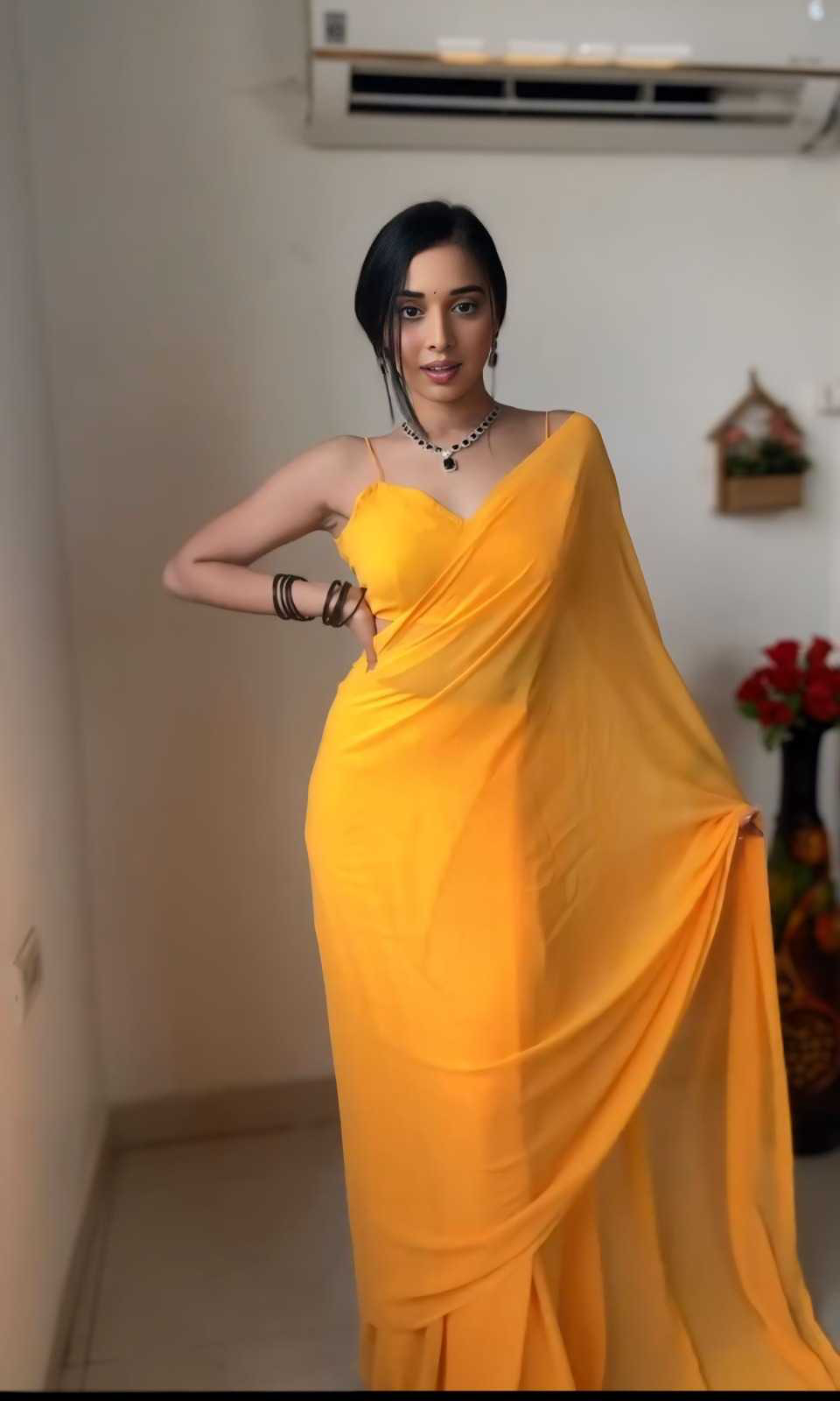 Pretty Yellow Color Soft Georgette Silk Design All Over Work Saree